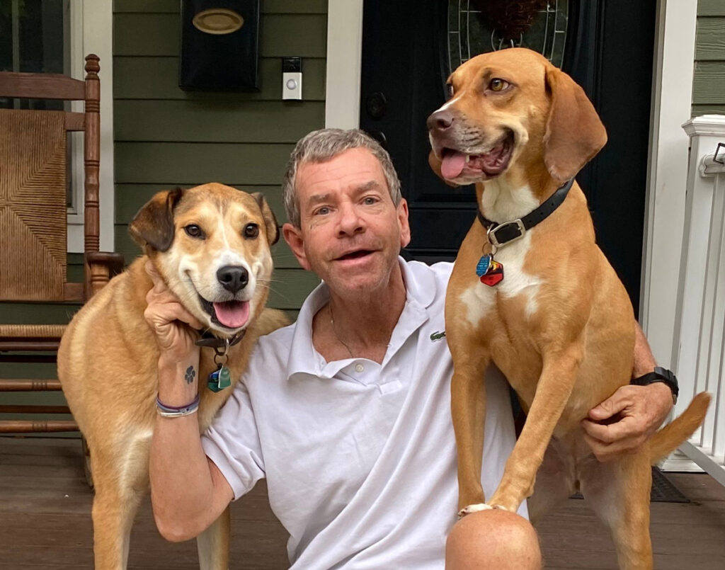 Bill Sinnott and his two dogs, Rey and Major.